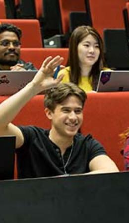 Students attending a lecture at university