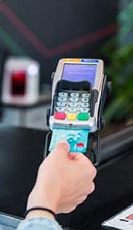 Student paying with bank card